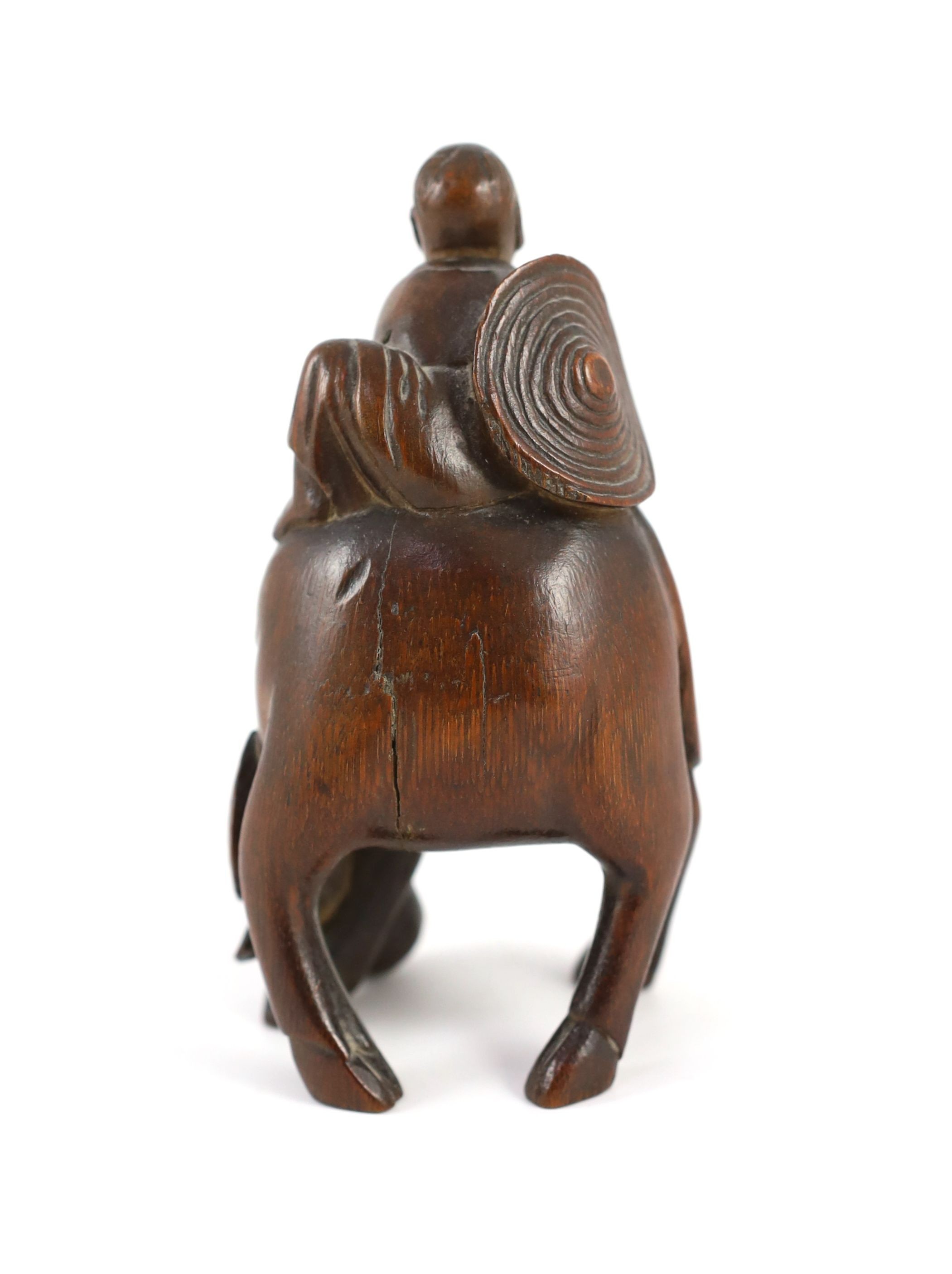 A Chinese bamboo group of boy riding a buffalo, 18th/19th century, 12.5 cm high